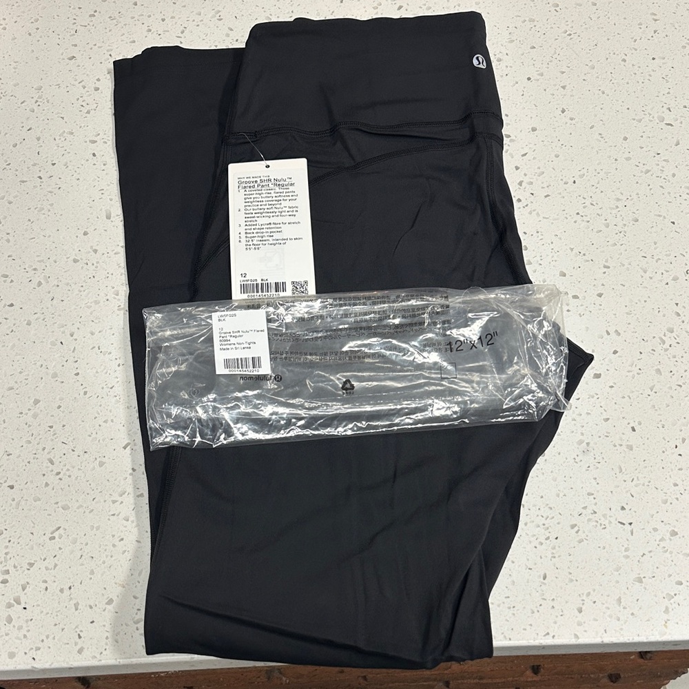 Lululemon Athletica Leggings Groove SHR Niki Flared Pant Regular